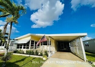 Building Photo - 102 Queen Palm Dr