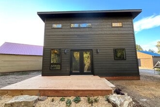 Building Photo - Charming Tiny Home with a Deck, Creek Fron...