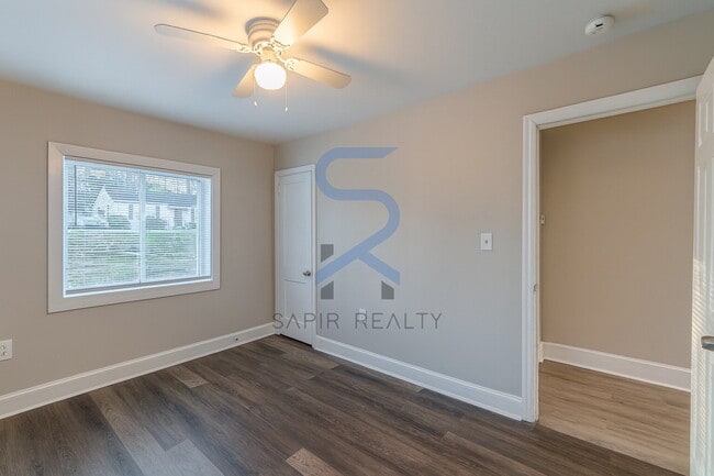 Building Photo - Move in before January 15th and choose your reward: a $250 Amazon Gift Card or a 55" Smart TV!