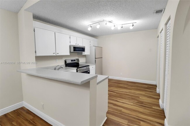 Building Photo - 10111 W Sunrise Blvd
