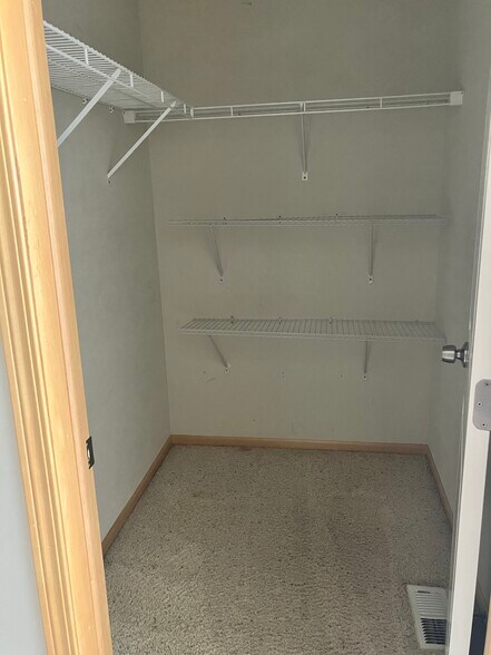second bedroom walk-in - 906 SE Crossings Ln