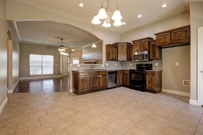 Building Photo - Spacious 4-Bedroom Home with Modern Upgrad...