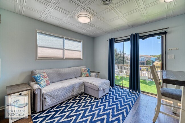 Building Photo - Beach Please @ 218 Sandpiper Dr