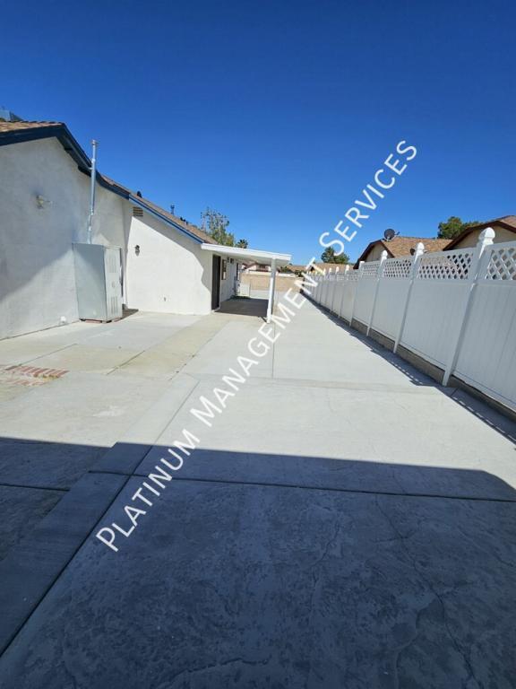 Building Photo - 4206 E Ave Q14