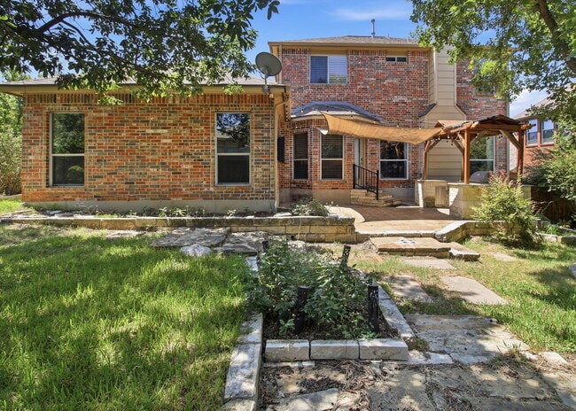 Building Photo - Updated two story. Gated subdivision. Gorgeous patio and yard!