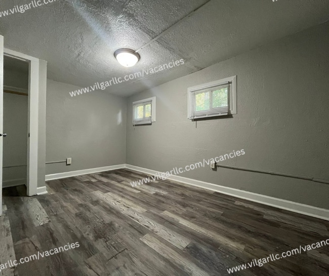 Building Photo - 6065 E 6th Pl