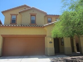 Building Photo - Adorable 2 story patio style with three spacious bedrooms and two full baths upstairs