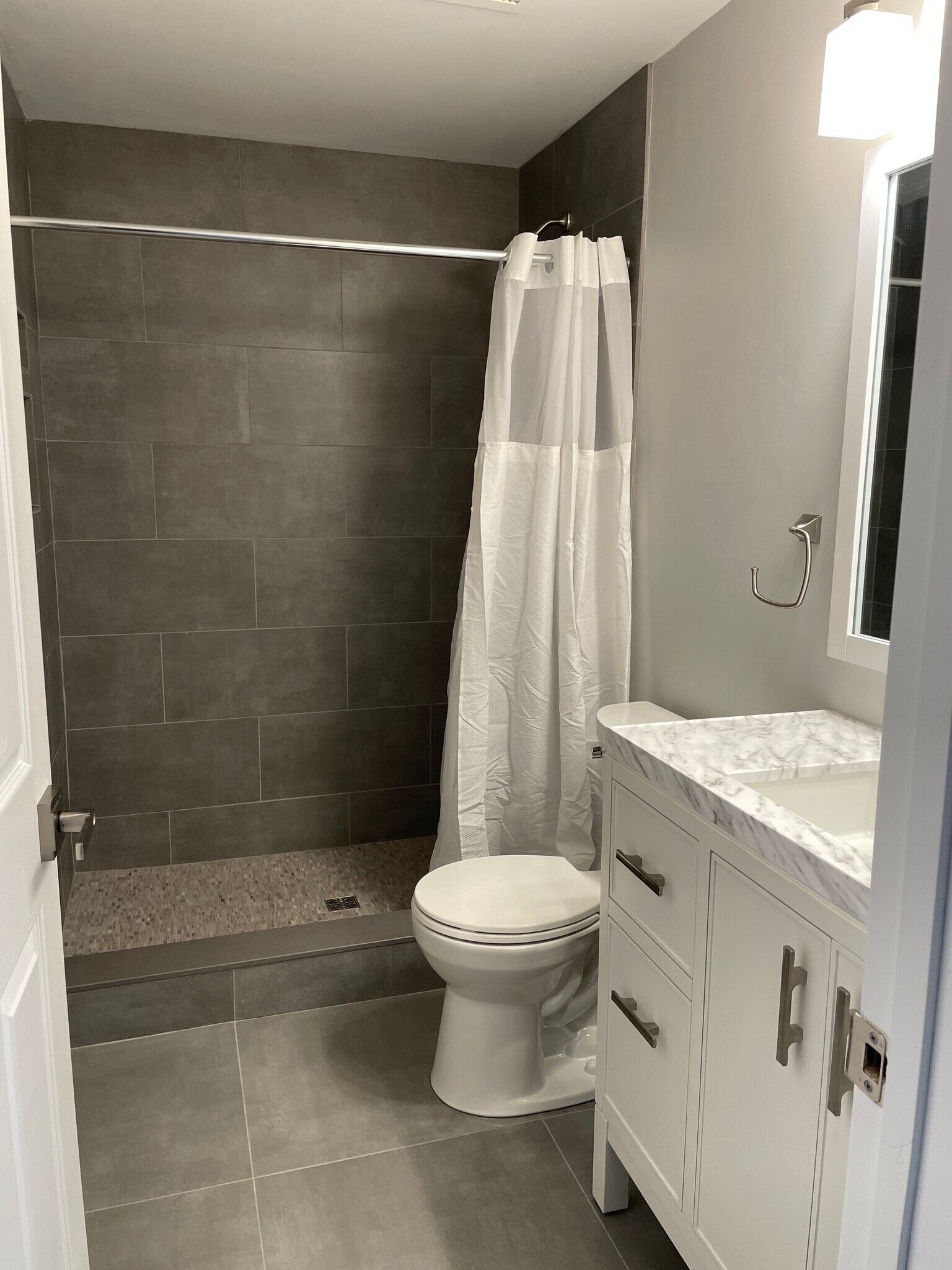 Recently renovated full bathroom upstairs - 33 Deer St