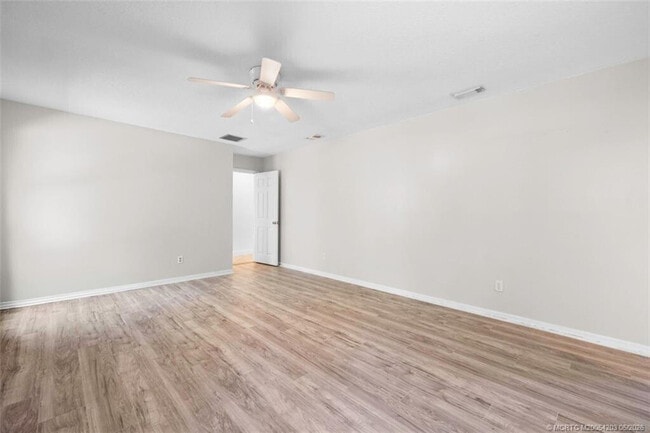 Building Photo - 3074 NE Loquat Ln