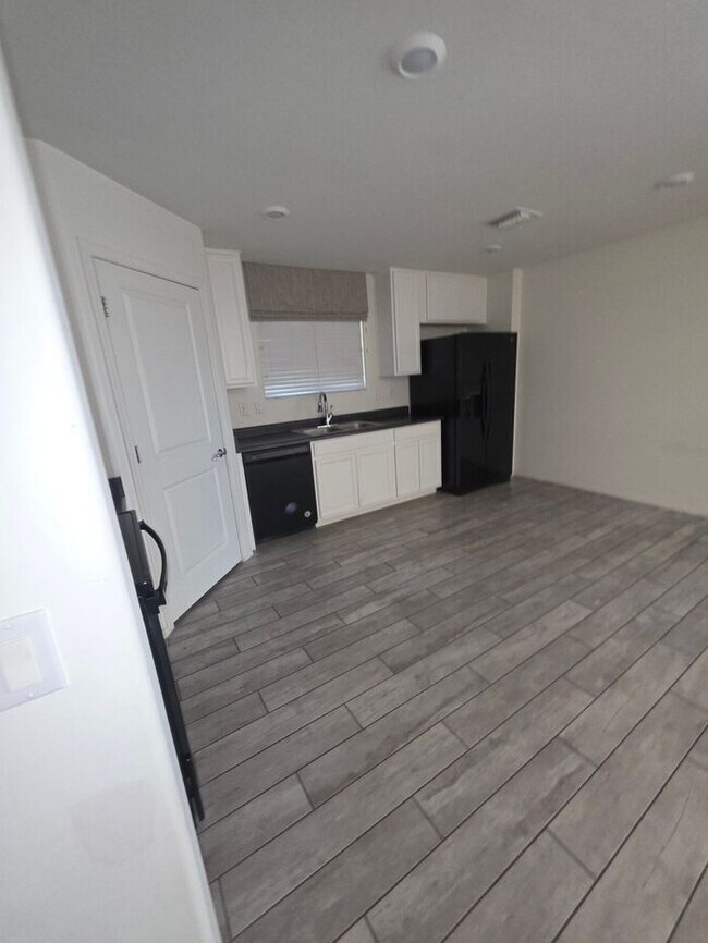 Building Photo - COMING SOON! New 3BR 2 BA Home w/ 2-Car Garage • Stainless Kitchen • Timer-Irrigated Yard in East...