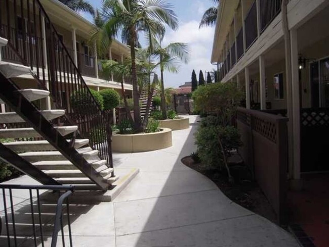 Building Photo - AFFORDABLE 1st Floor Condo & patio yard!
