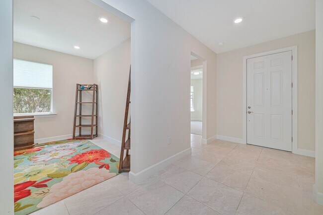 Building Photo - NOW AVAILABLE - 2/2 Plus Den Single Family Home in the Heart of Estero!
