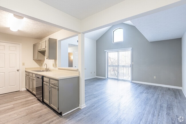 2BR, 1.5BA - 935 - Kitchen and Living Room - Crown Pointe