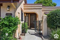 Building Photo - Southwestern Charm Meets Modern Comfort — 2BR/2BA Condo with Access to Shared Pool!
