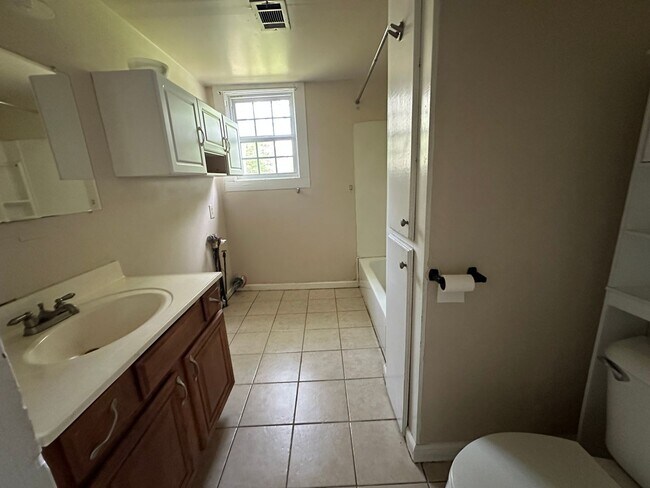 Building Photo - Welcome to this charming 3-bedroom, 2-bathroom home located in Atkins, AR