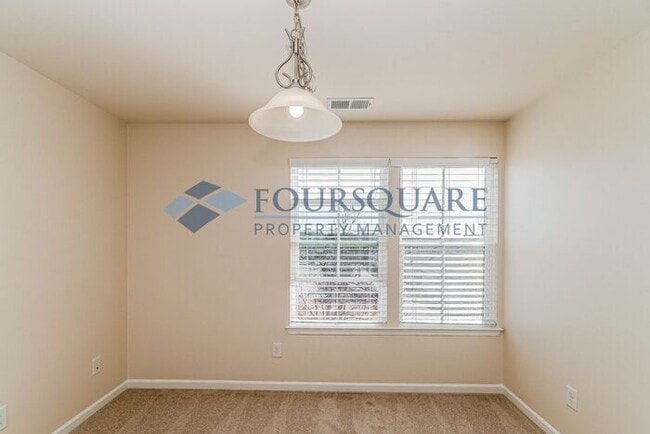 Building Photo - Spacious 3-Bed End Unit Townhome with 2-Car Garage & Private Patio | Prime Kitts Creek Location