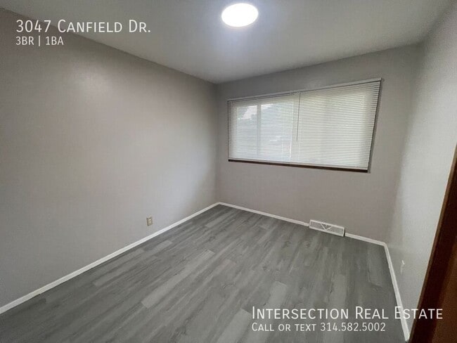 Building Photo - 3047 Canfield Dr