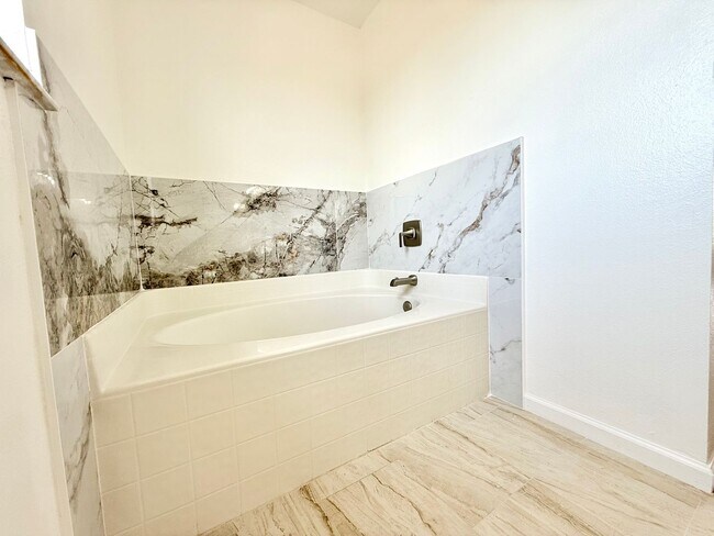 Building Photo - The perfect haven - 4Bedrooms / 2.5Bath family home at Orlando!