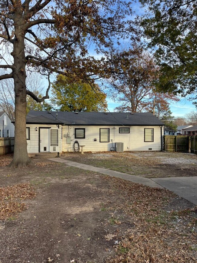 Building Photo - Step into this beautifully updated 1950's gem, where charm meets modern convenience