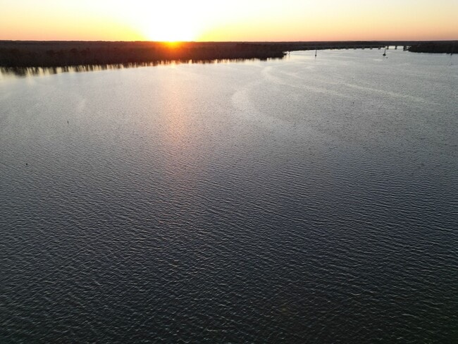 Building Photo - Fully Furnished Waterfront Elegance on Mai...