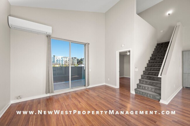 Building Photo - Views, Views, Views! Stunning Top-Floor Little Italy 2-bedroom Loft at The Waterfront!