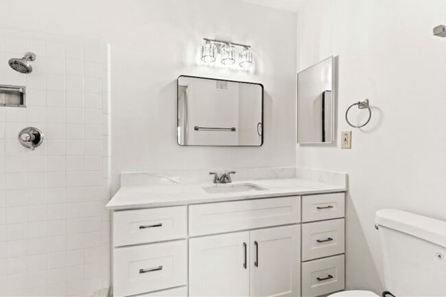 Building Photo - Modern 2-Bedroom Condo with Pool and Koi Pond Views