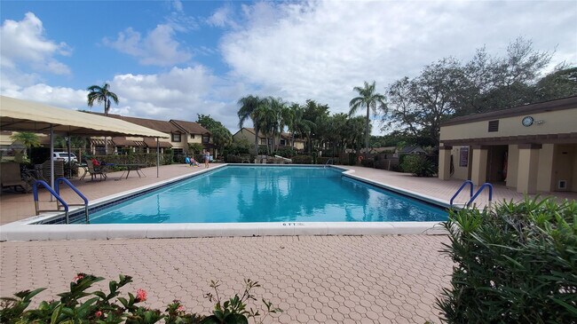 Building Photo - 3831 Cocoplum Cir