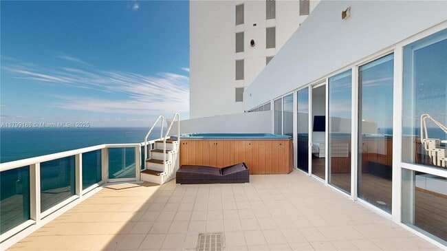 Building Photo - 18201 Collins Ave