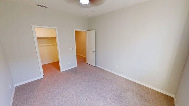 Building Photo - Bayfront Coastal Condo at The Strand | 3BR + 2-Car Garage, Resort-Style Amenities