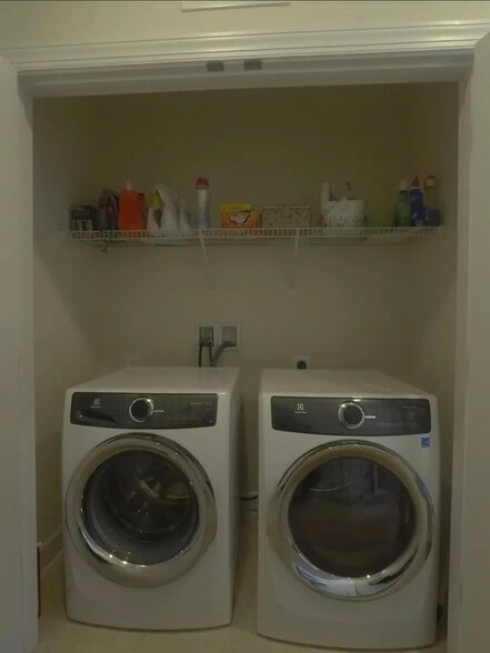 Laundry room, modern appliances, adjacent to Master BR - 8828 Englewood Farms Dr