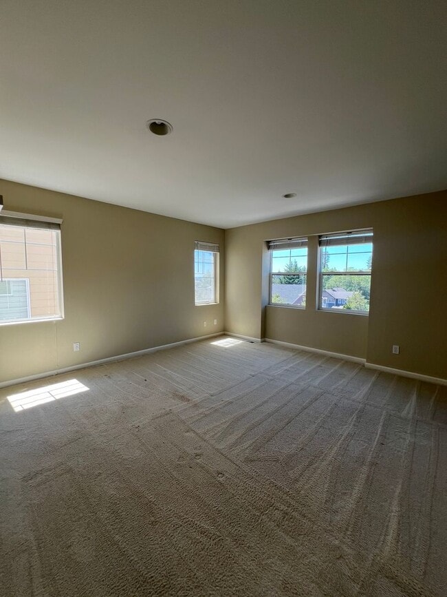 Building Photo - Spacious 4 Bedroom Home with Zen Backyard and 3-Car Garage