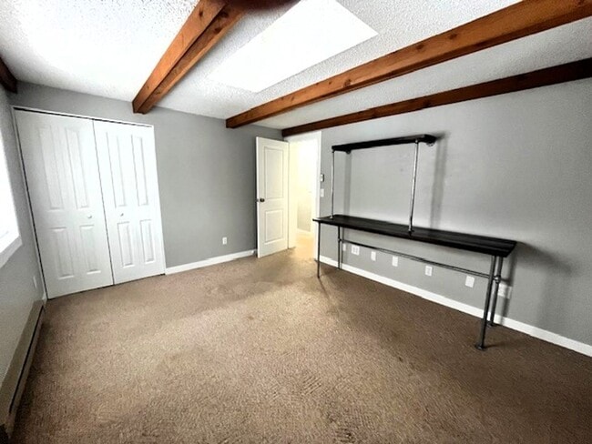 Building Photo - Long Term Rental- Creekside Condominiums #20C - UNFURNISHED