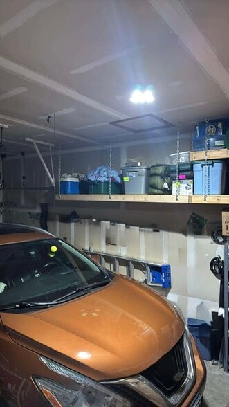 Garage with storage on both sides - 4727 W Antelope Dr