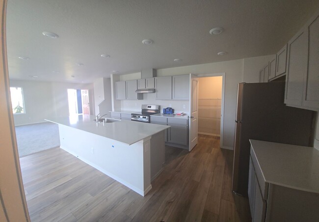 Building Photo - Brand-New 4-Bedroom Townhouse in Hayden Ca...