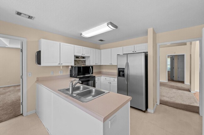 Building Photo - Beautiful 4-Bedroom Home with Lagoon Views in Pooler's Arbors at Godley Station