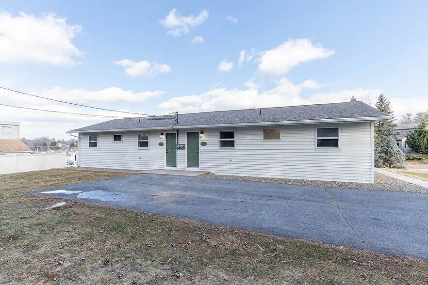 rear of house with parking pad - 1026 N Atherton St