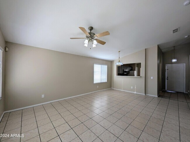 Building Photo - 7059 W Gardenia Ave