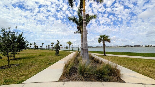 Building Photo - EXCEPTIONAL AND SPACIOUS FURNISHED TOWNHOME WITHIN WATERSIDE- NAUTIQUE!