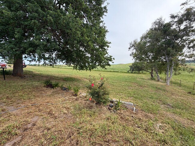Building Photo - Secluded country home w/ 2-car garage
