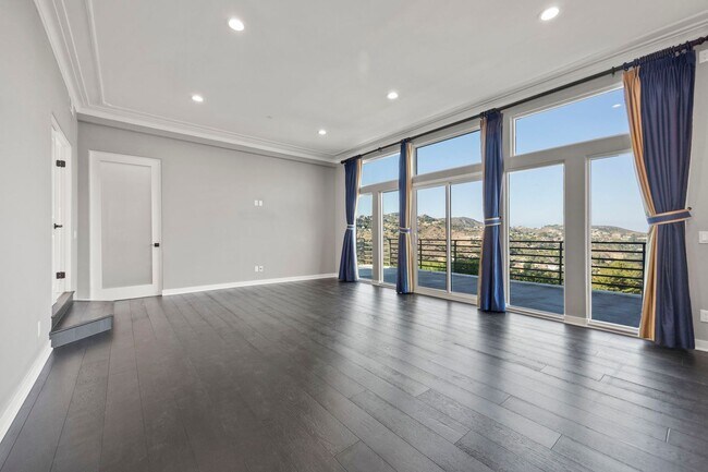 Building Photo - Modern Elegance Meets Scenic Privacy in Be...