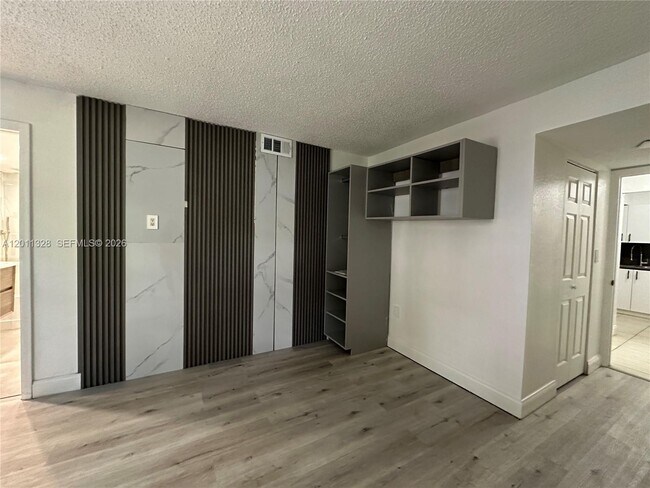 Building Photo - 4215 N University Dr