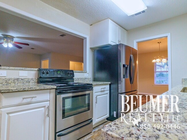 Building Photo - Charming Corner Haven 4BR/3BA Brick Home for Rent