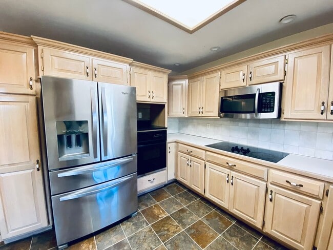 Building Photo - {5639} Spacious Ranch + Two Separate Living Quarters + Fenced Yard!