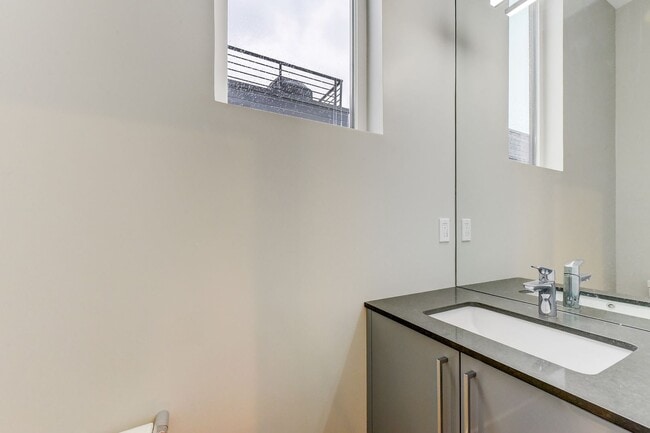 Building Photo - Smart Layout, Prime Location, and a Rooftop That Seals the Deal