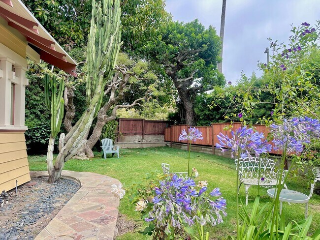 Building Photo - Meticulously Restored 1920s Craftsman on a Private, Hedged Lot | Pet Friendly!