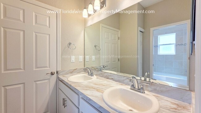 Building Photo - BRILLIANT 4 BEDROOM/2.5 BATH HOME AVAILABLE IN AVIARY at RUTLAND RANCH PARRISH!