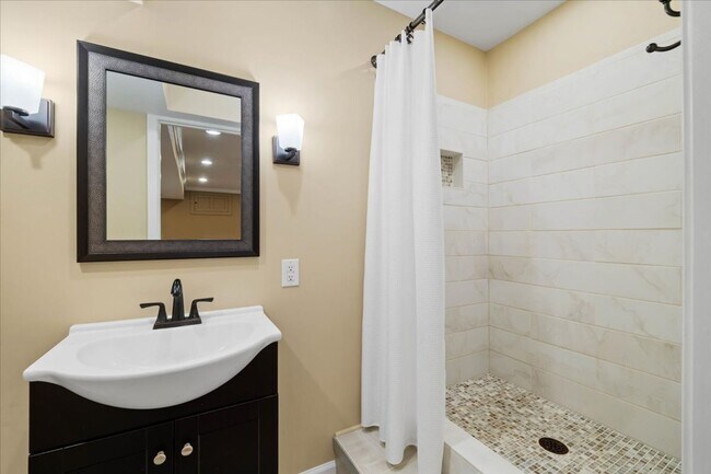 Building Photo - Spacious Home with Fenced Yard Exclusive A...
