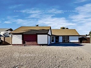 Building Photo - 7141 W Paradise Dr