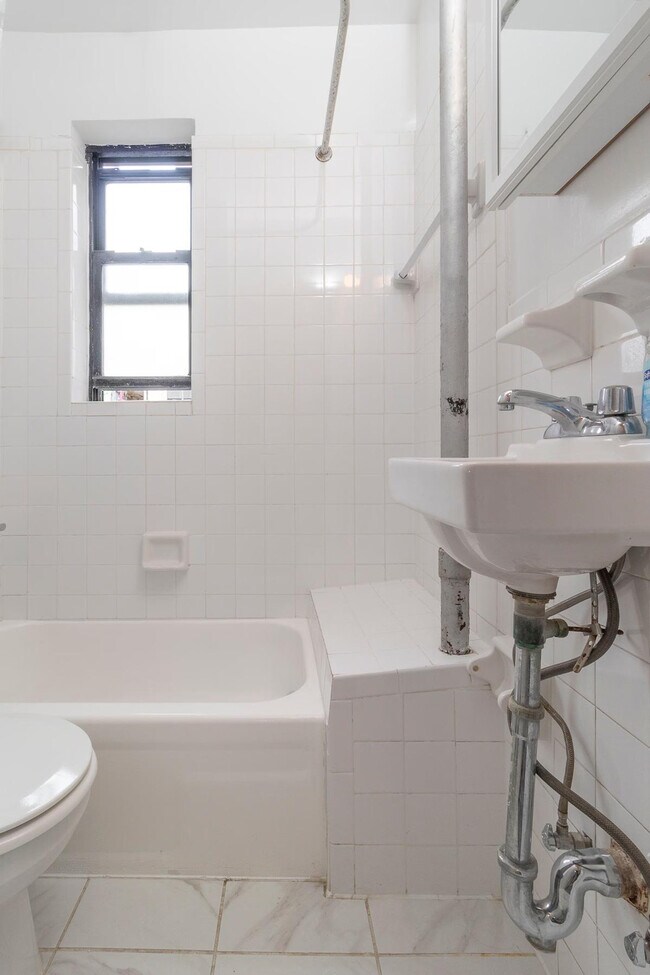 Building Photo - 306-318-318 E 96th St