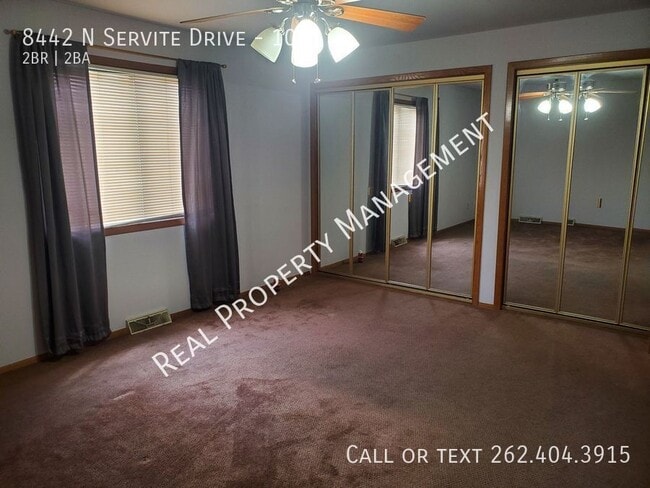 Building Photo - 8442 N Servite Dr